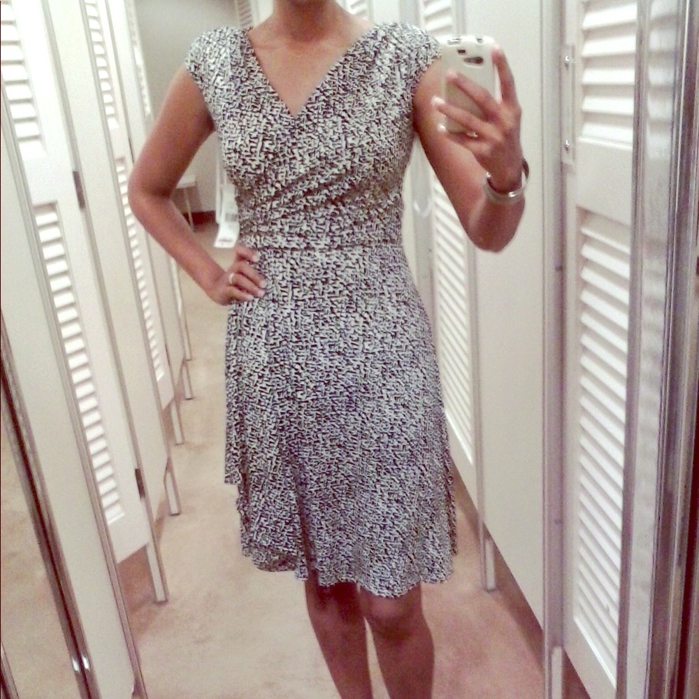 Black and white faux wrap dress with cap sleeves